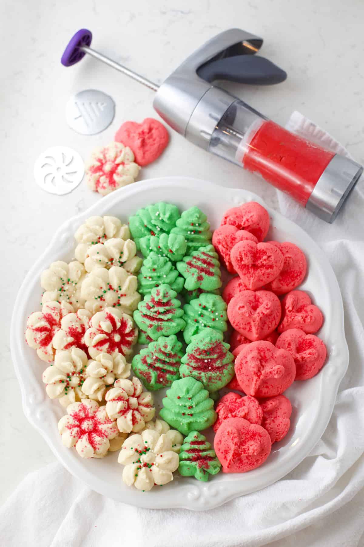 https://www.momlovesbaking.com/wp-content/uploads/2020/12/Christmas-Cookie-Press-Cookies-1.jpg