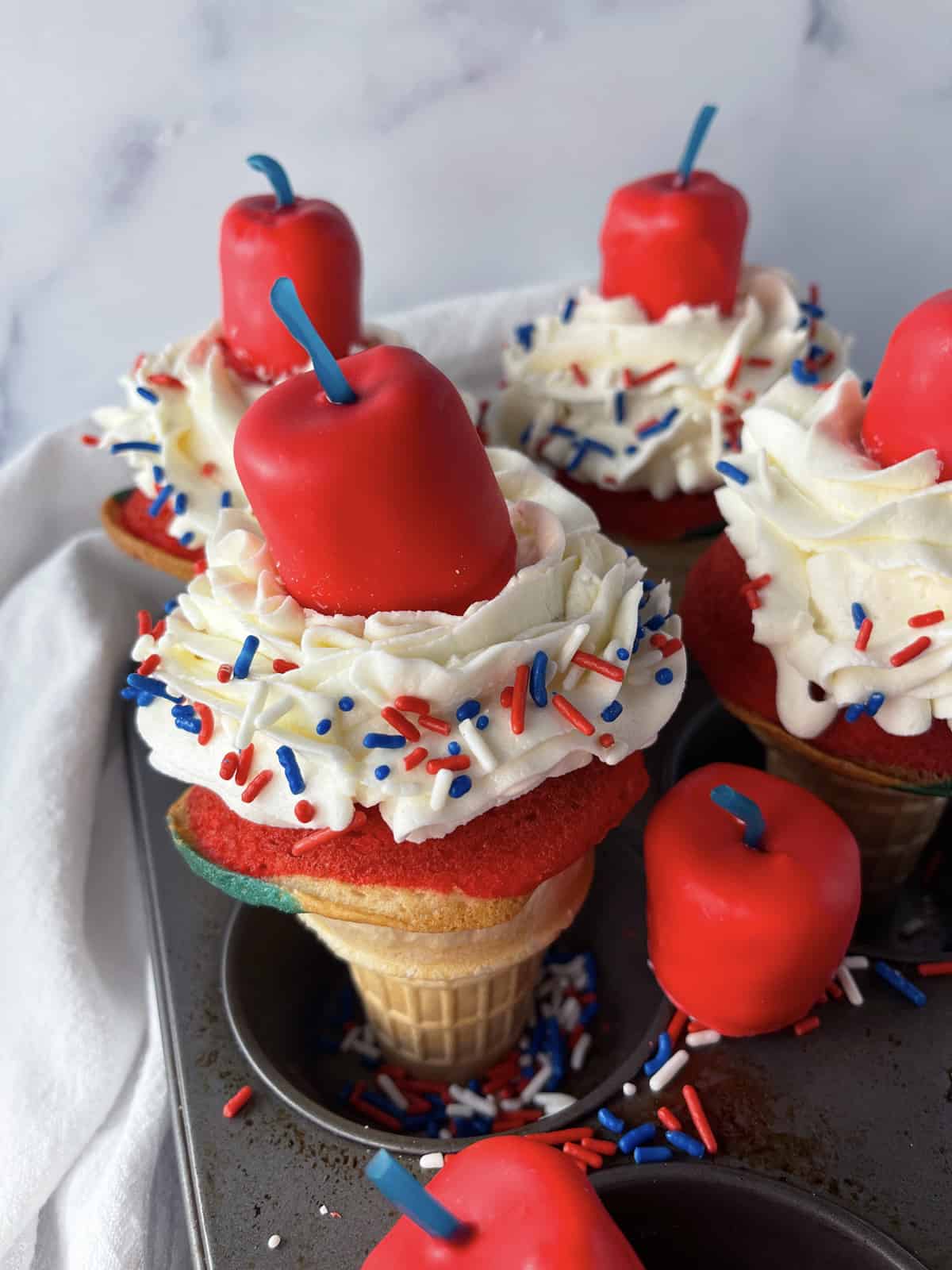 https://www.momlovesbaking.com/wp-content/uploads/2023/05/Firecracker-cupcake-cones.jpg