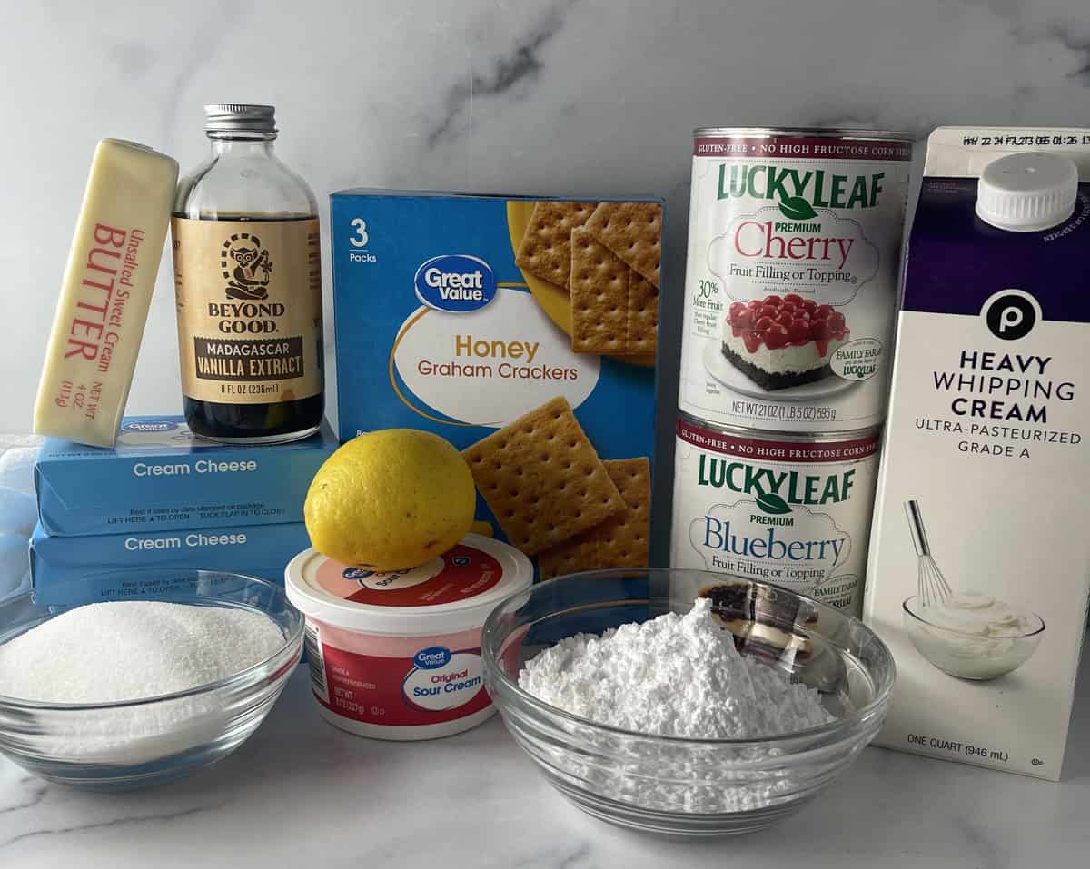 Ingredients needed to make American flag no bake cheesecake dessert.