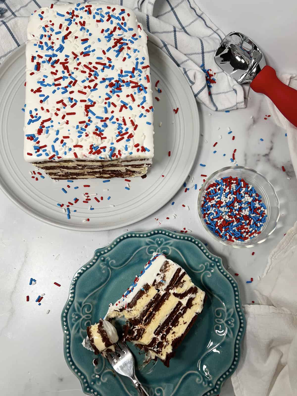 Ice cream cake sliced on a plate.