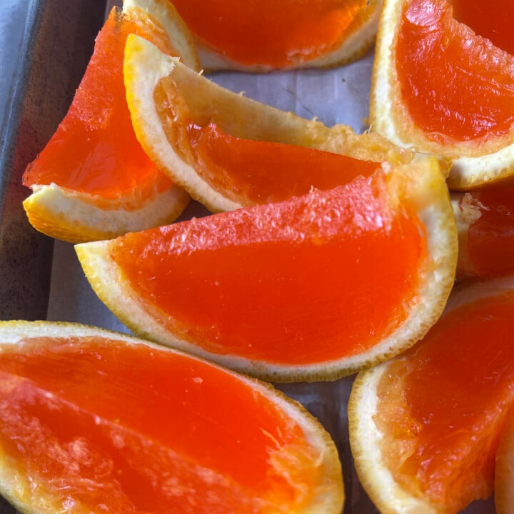 Aperol spritz jello shots in orange peels.