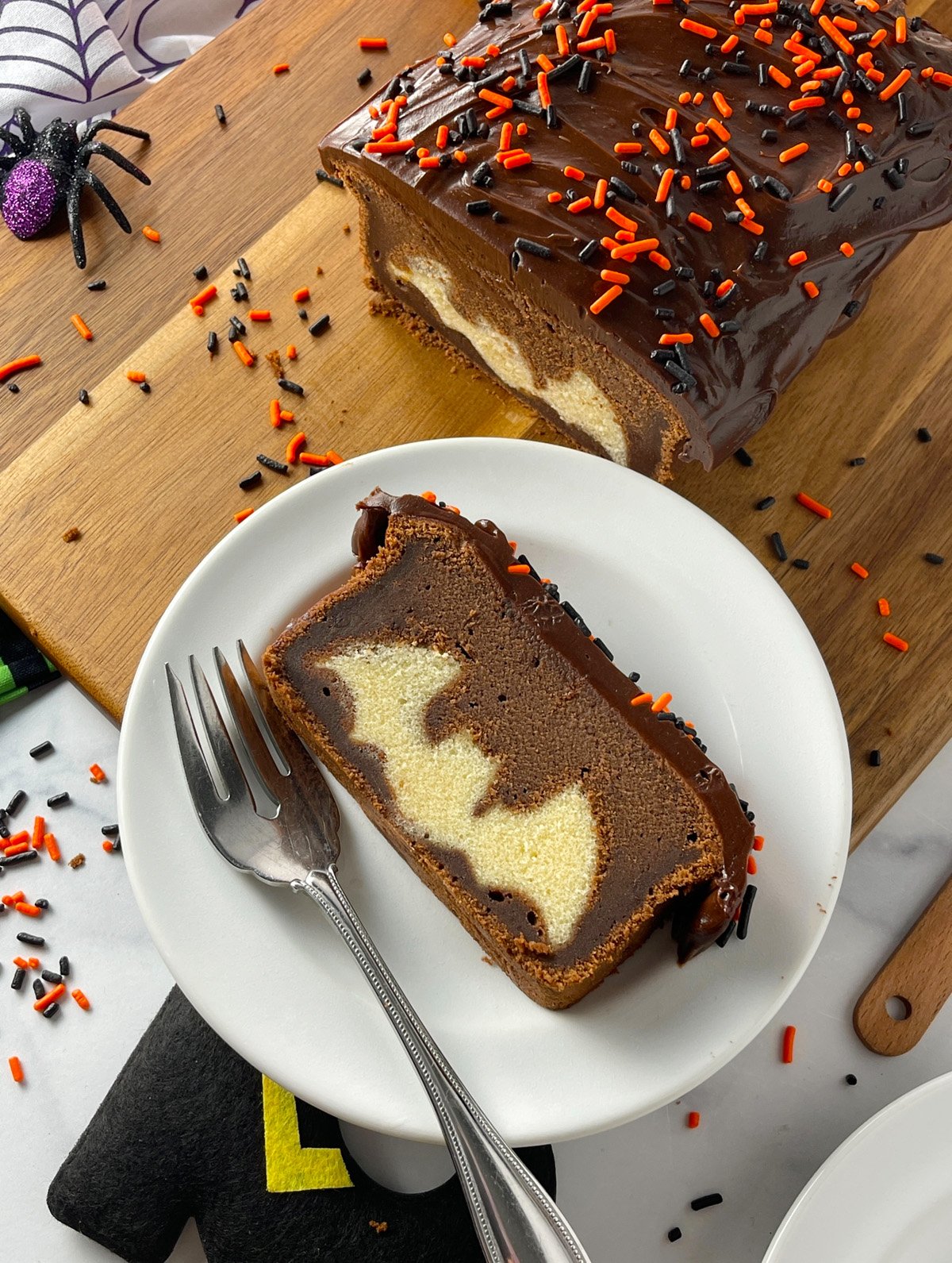 Decadent Chocolate Pound Cake with a Peek-a-Boo Bat Design for Halloween.