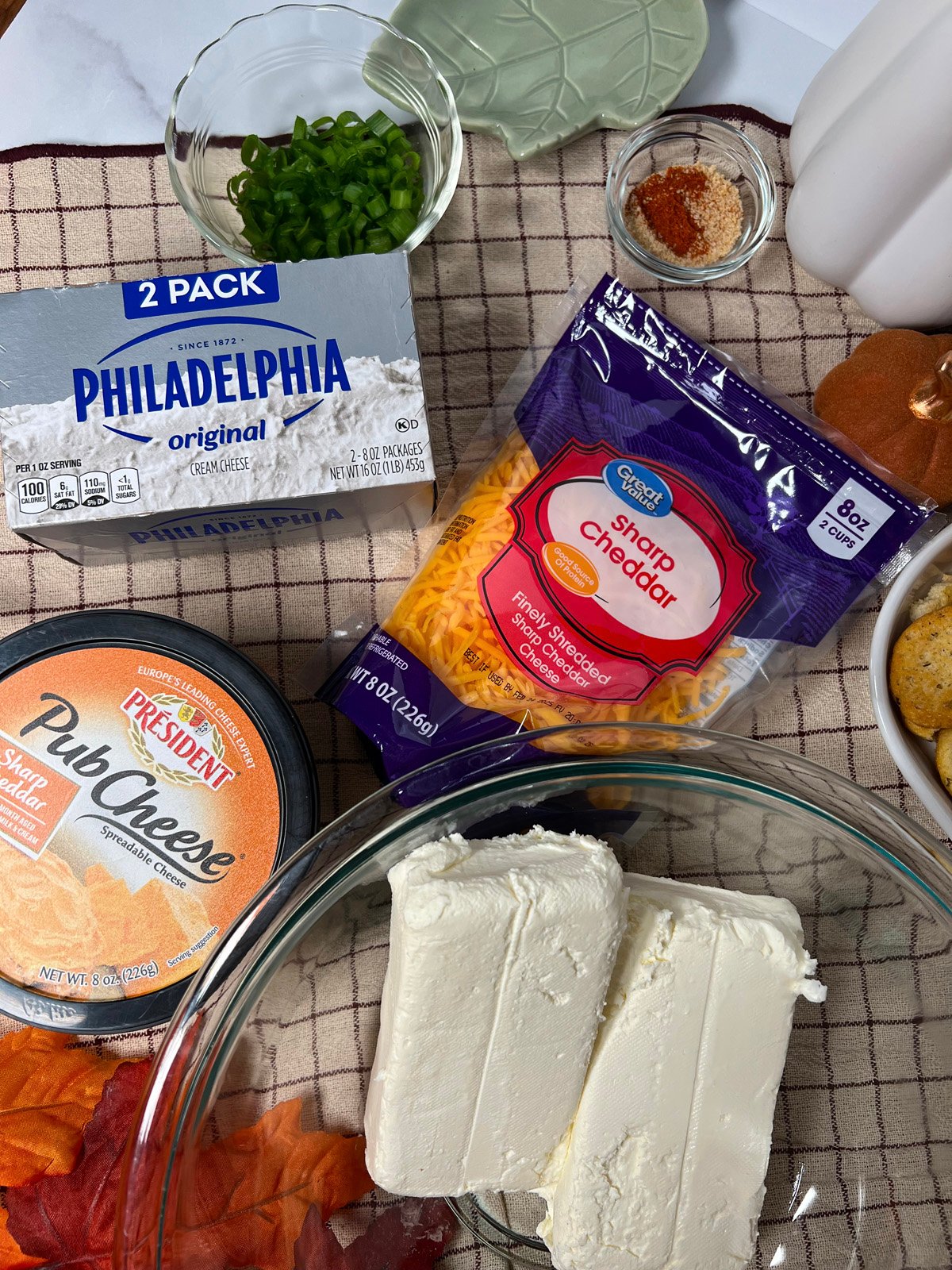 Cheese ball ingredients on the kitchen counter.