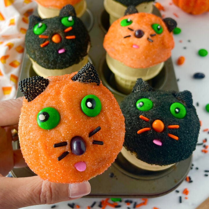 Kitty cat cupcakes in ice cream cones.