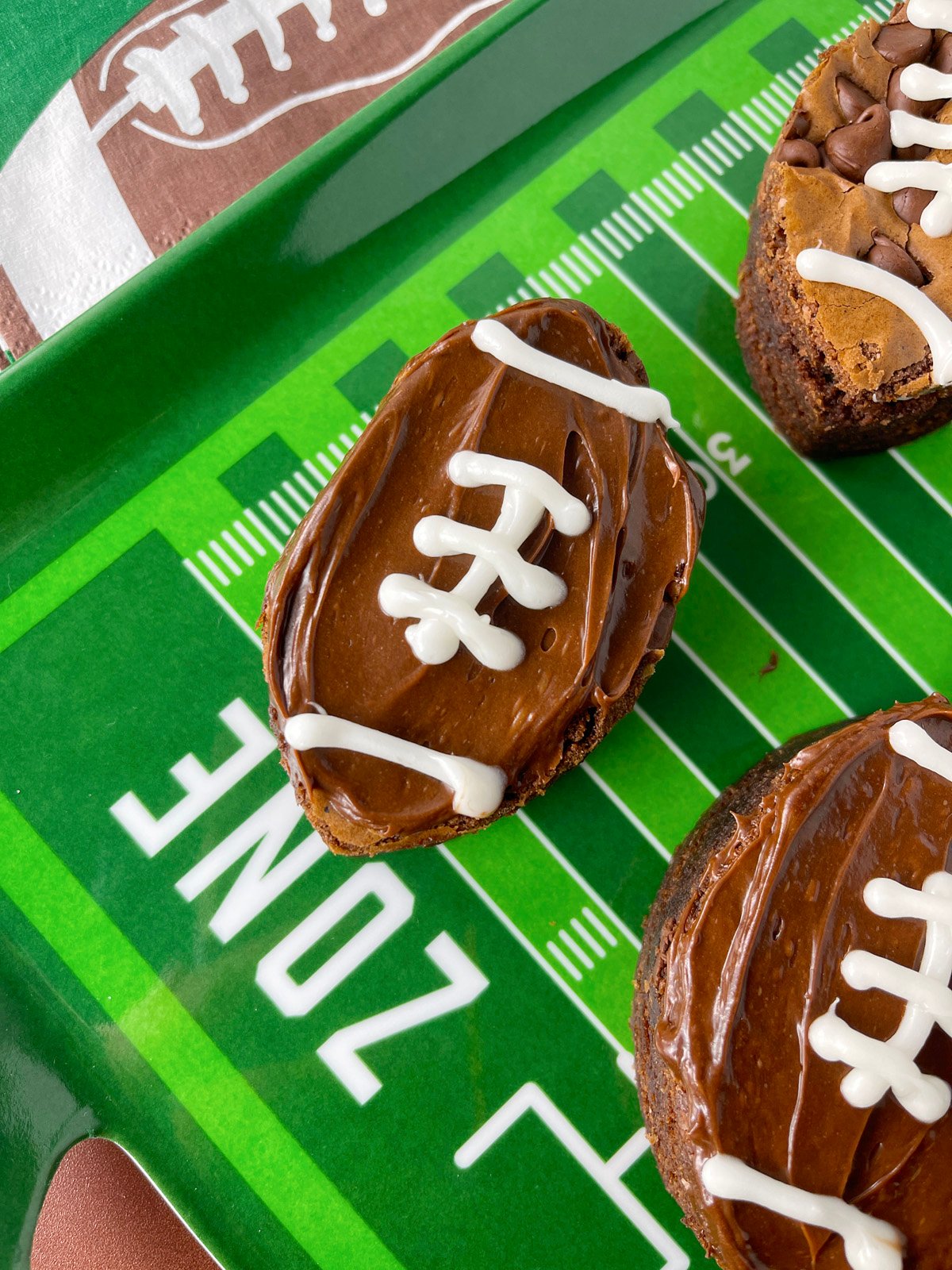 Football shaped brownie with chocolate icing and white icing laces.