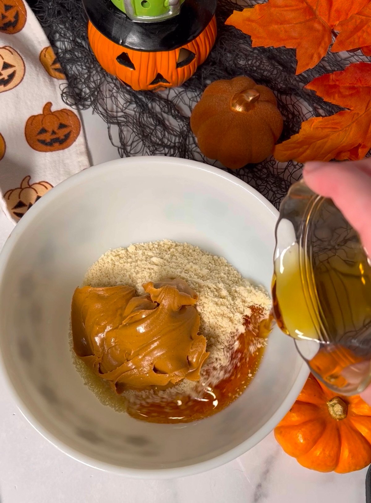 Mixing batter for peanut butter cups.