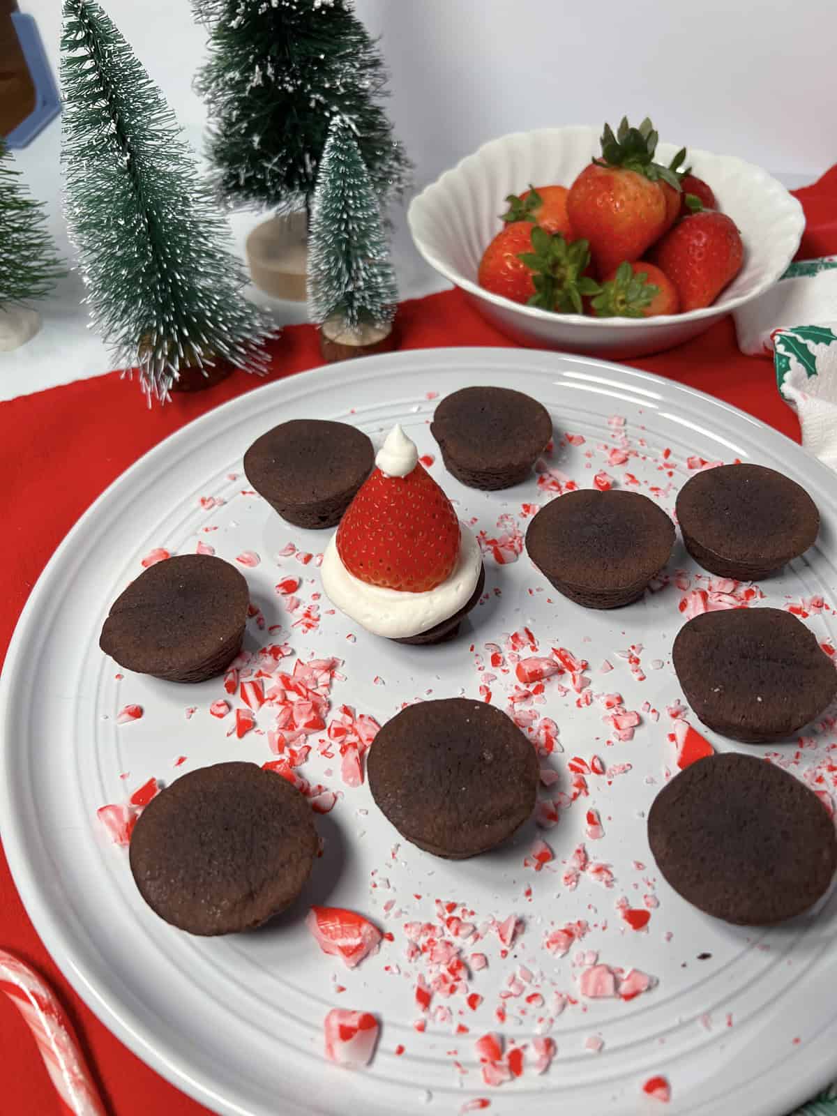 How to make strawberry Santa hat brownie bites.