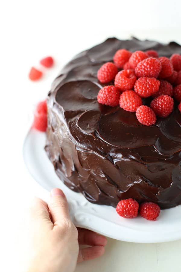 Chocolate raspberry layer cake with luscious chocolate ganache frosting.