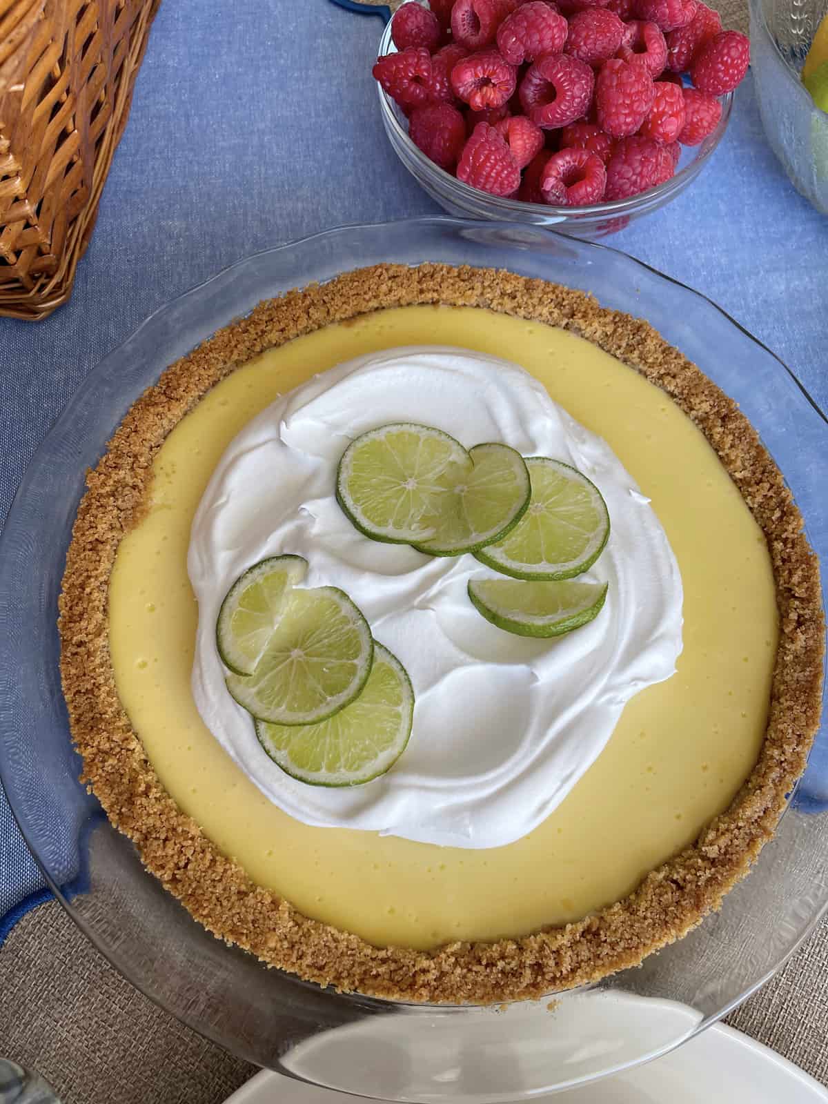 Key lime pie displayed on a dessert table.